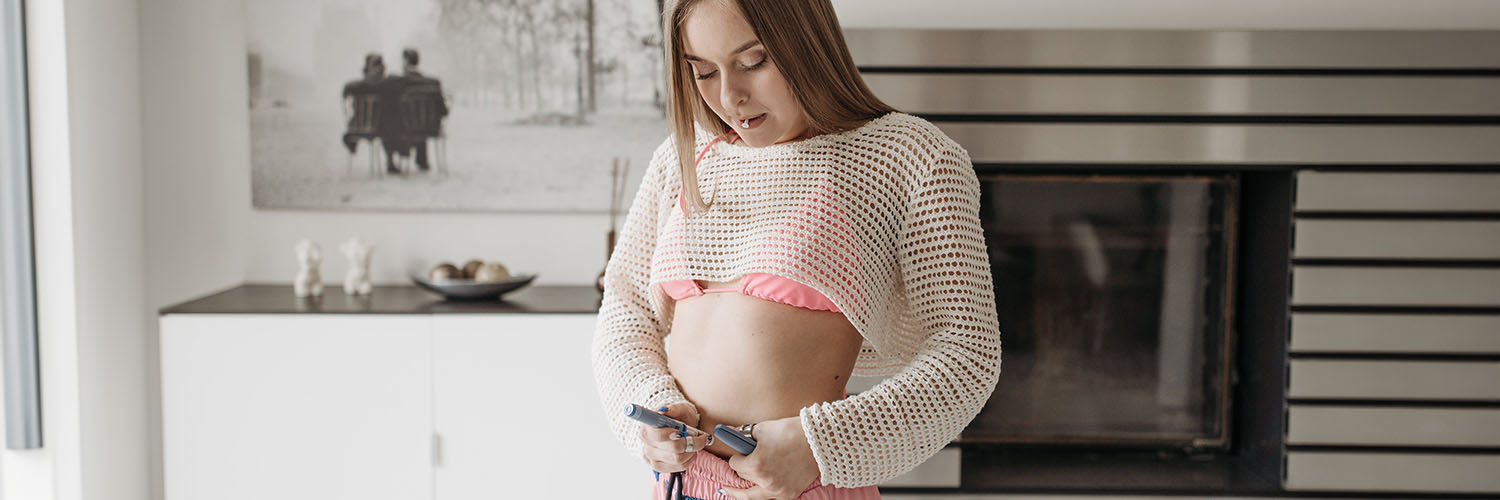 Woman injecting insulin